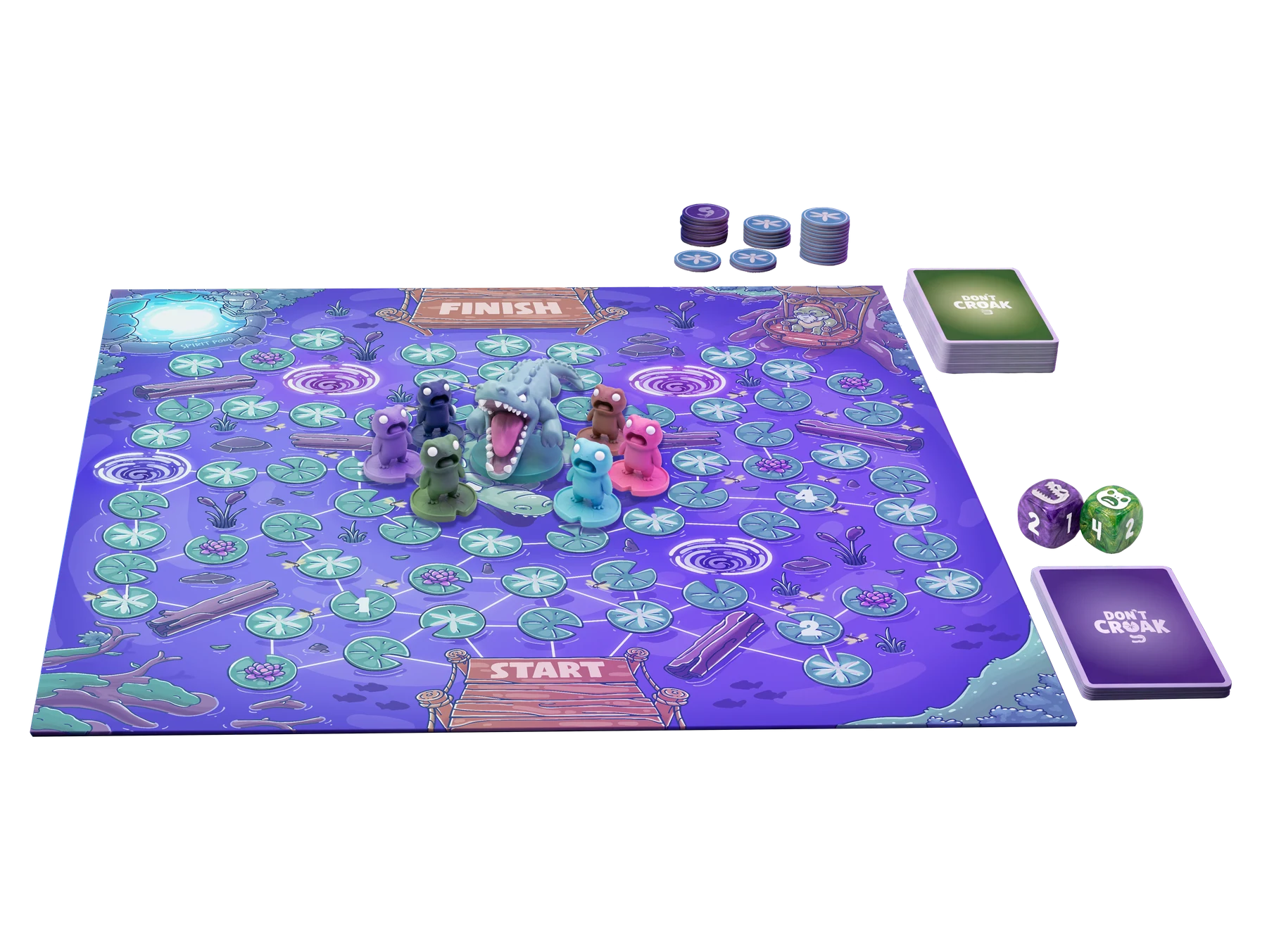 Render of the Don’t Croak pond board with lily-pad paths, frog and crocodile pieces, cards, dice and Dragonfly tokens.